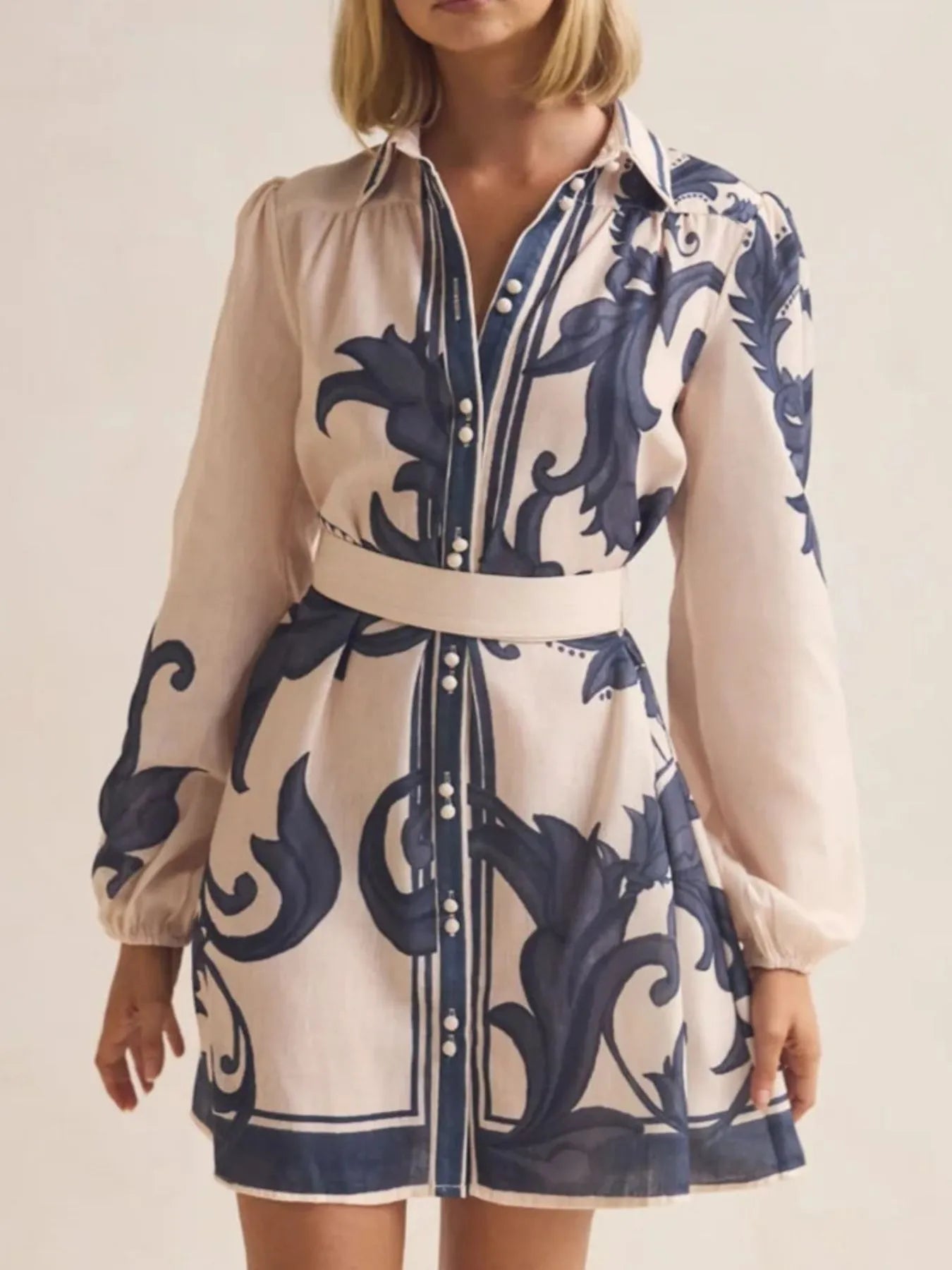 Printed Long Sleeve Shirt Dress with Tied Detail.