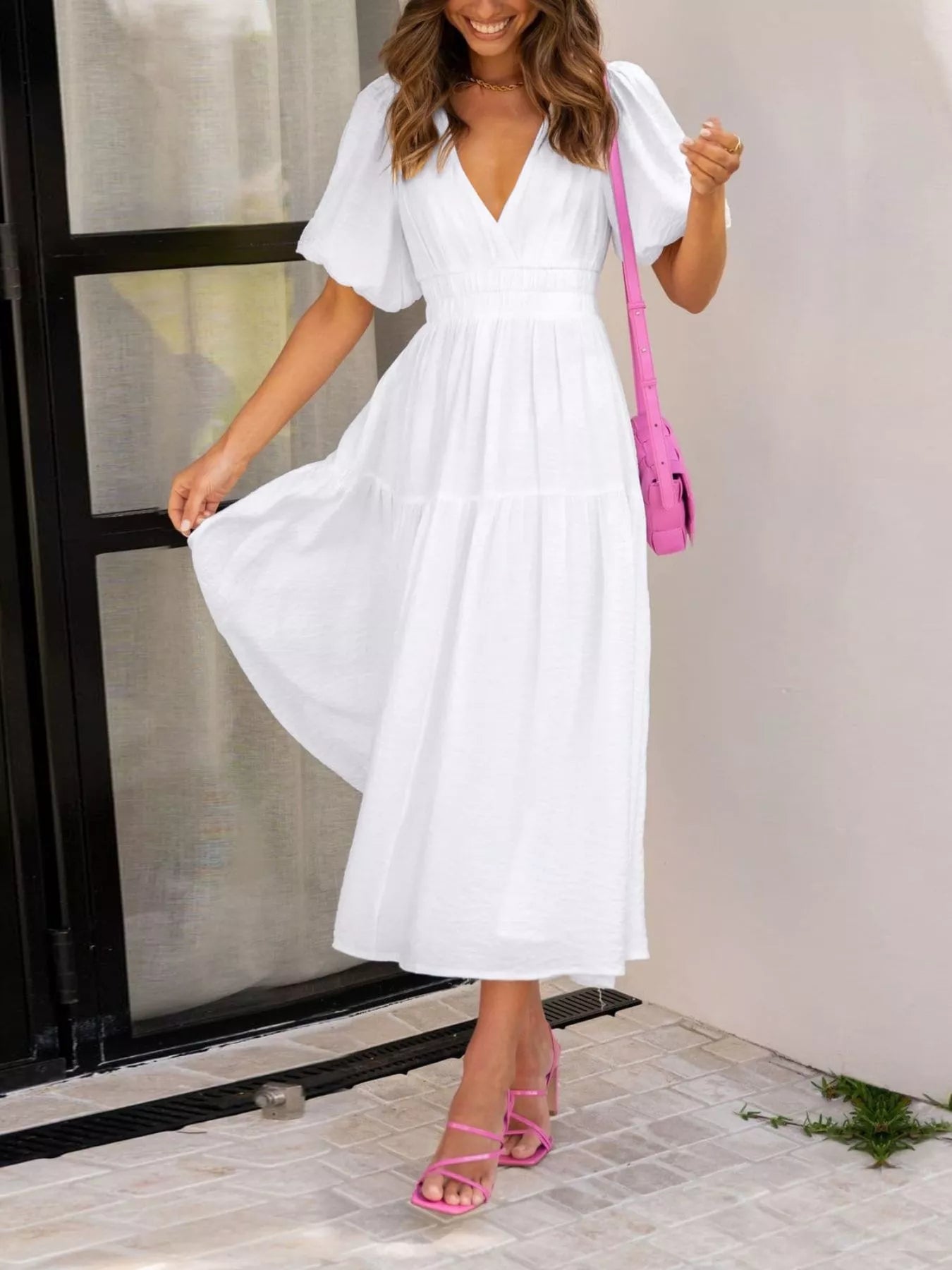Cream tiered midi dress with a V-neck, smocked waist, and short puff sleeves