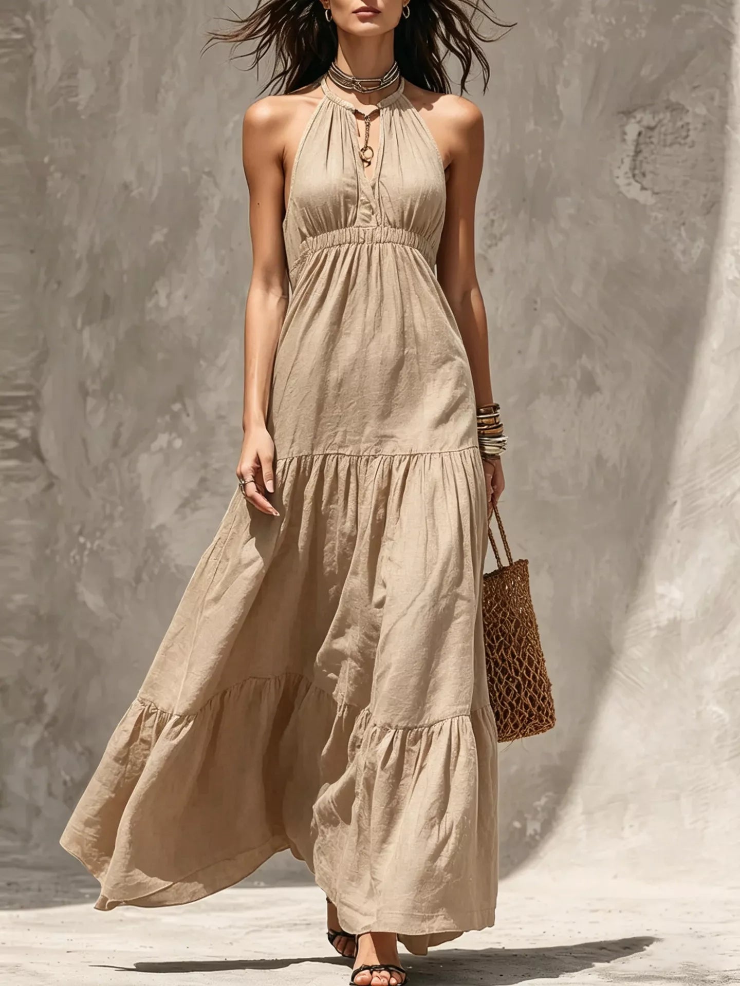 Sleeveless olive green tiered maxi dress with smocked waist and halter neckline