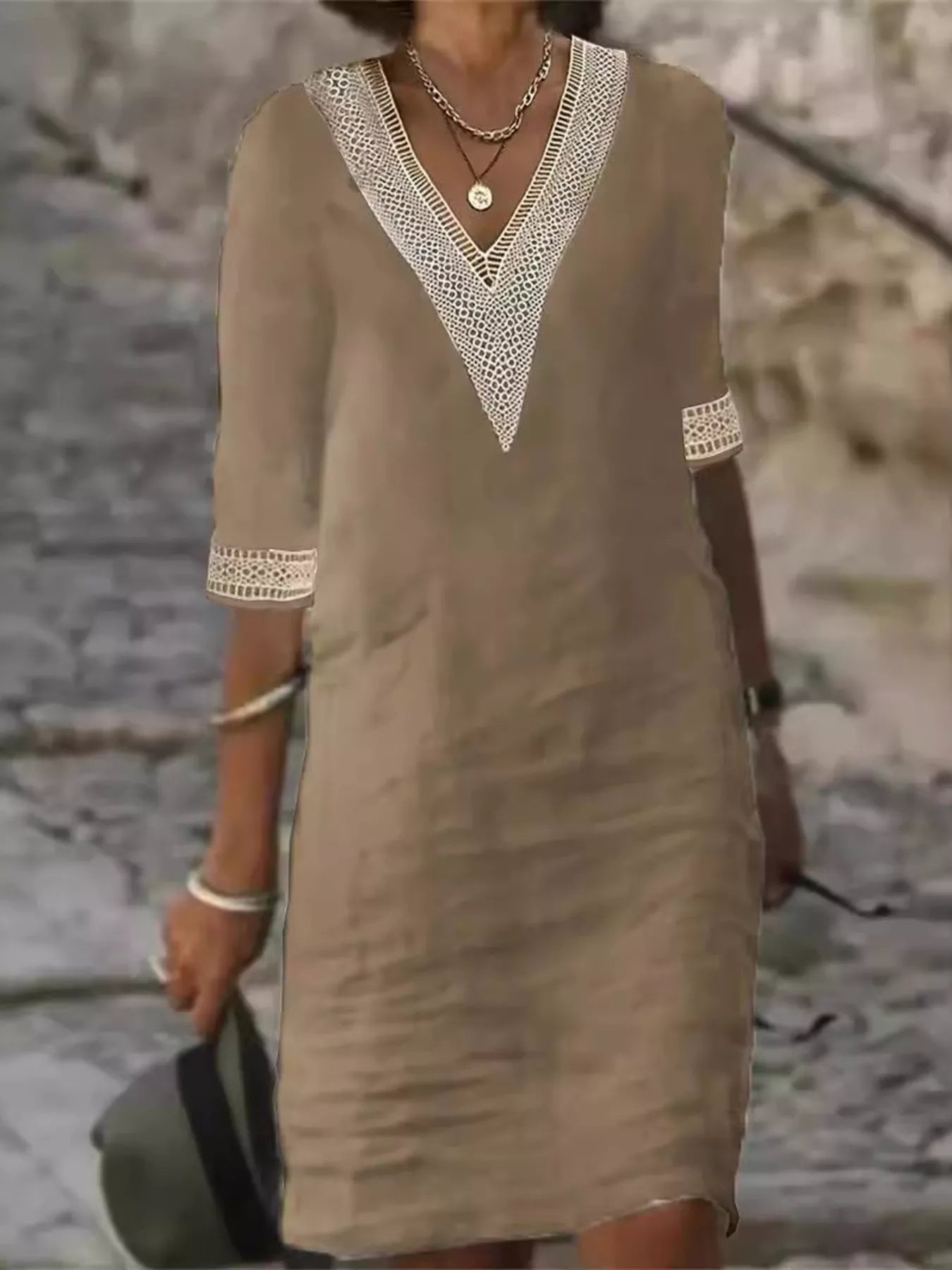 Plus-size white V-neck dress with lace trim and half sleeves