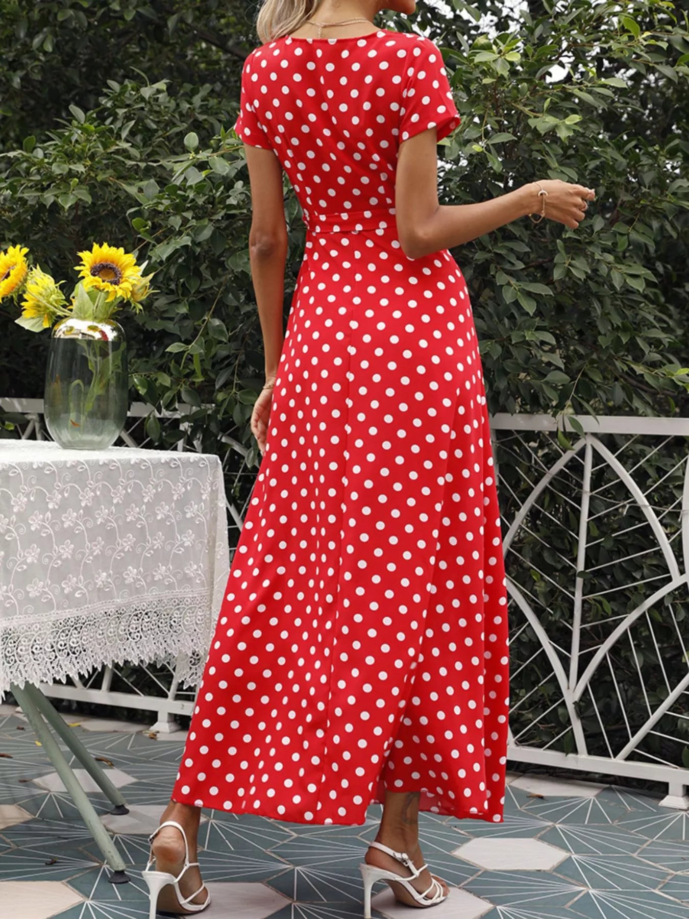 White polka dot wrap maxi dress with short sleeves, V-neck, waist tie and side slit