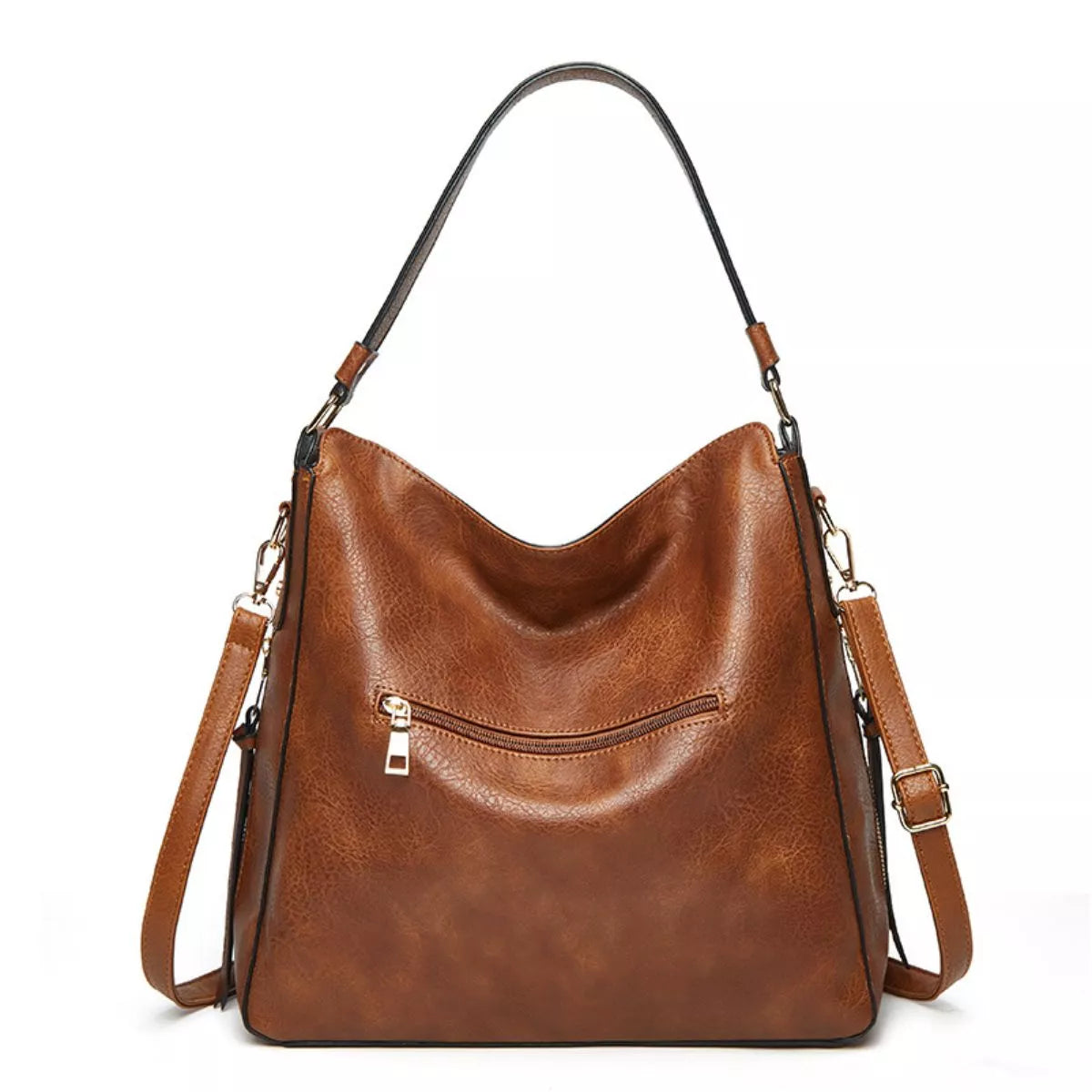 Medium brown PU leather crossbody bag with a slouchy silhouette, top handle, detachable shoulder strap, black edge trim, and front zip pocket.