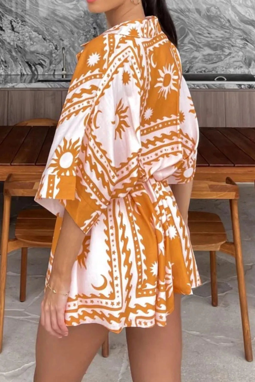 Printed Tie Waist Romper with Buttons.