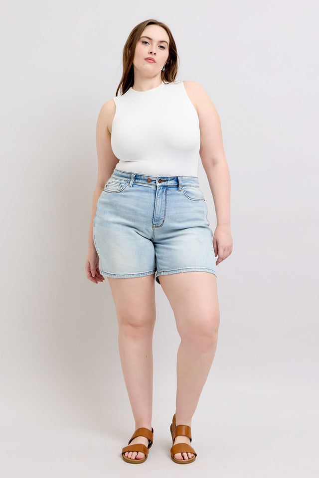 Plus size 2-button denim shorts with pockets.