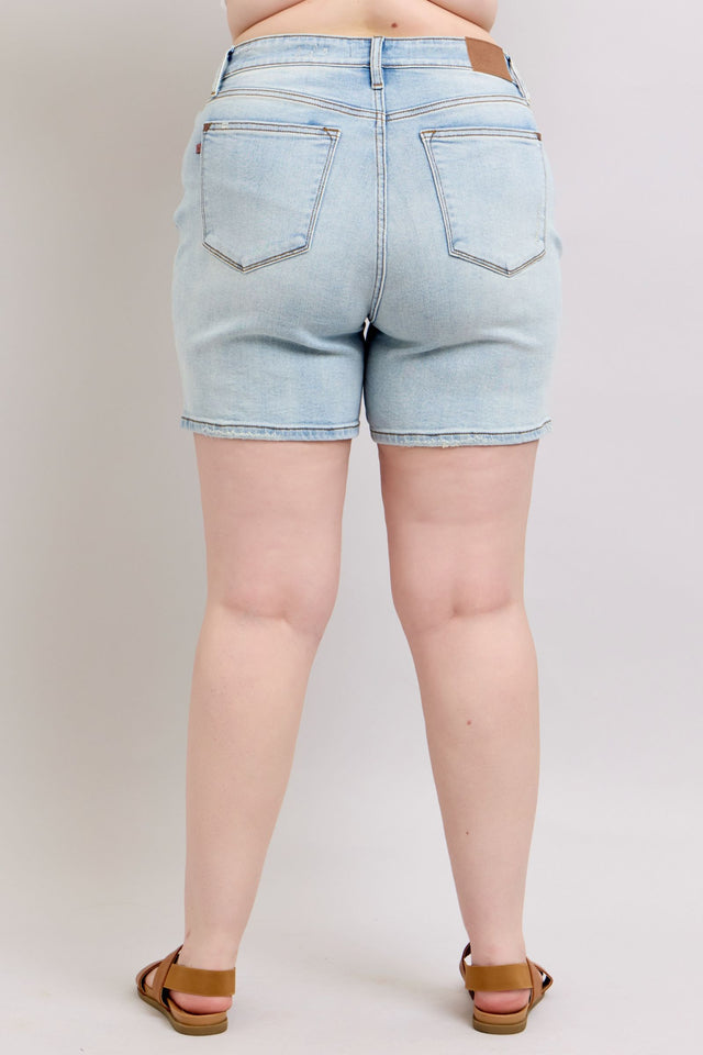 Plus size 2-button denim shorts with pockets.