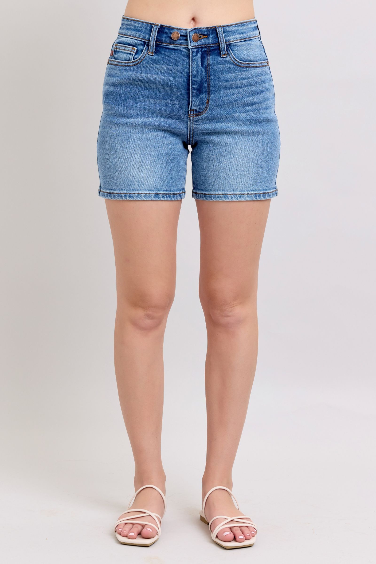 Plus size 2-button denim shorts with pockets.