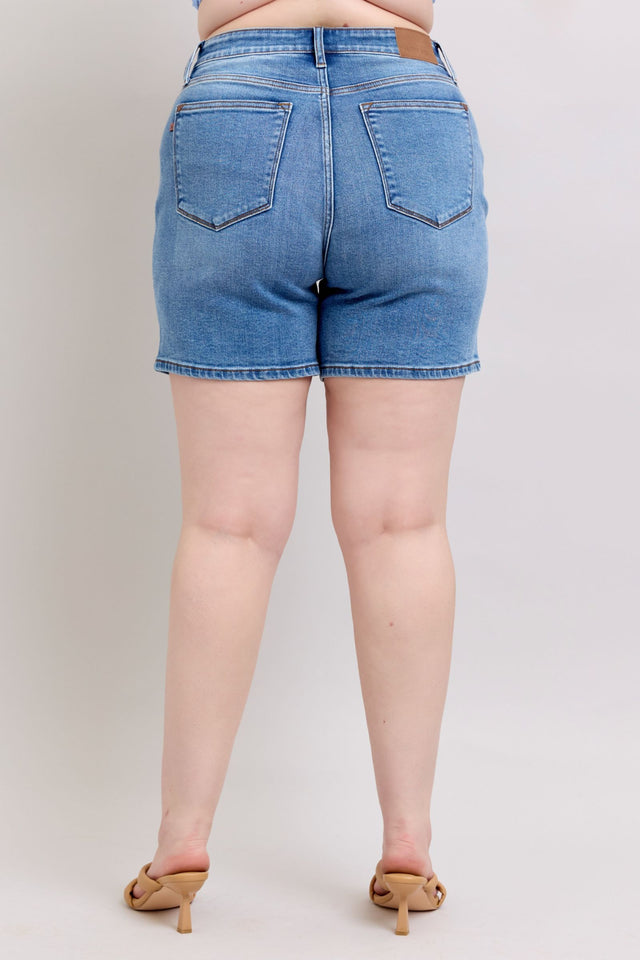 Plus size 2-button denim shorts with pockets.