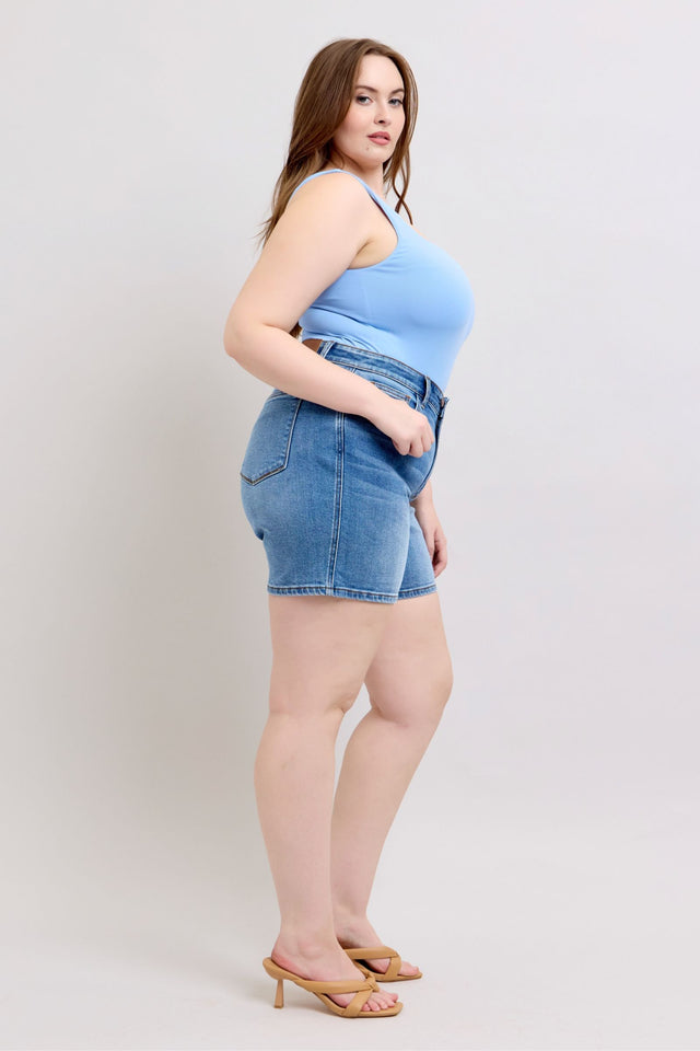 Plus size 2-button denim shorts with pockets.