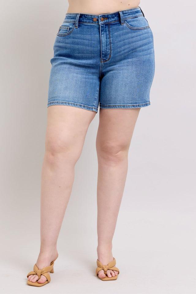 Plus size 2-button denim shorts with pockets.