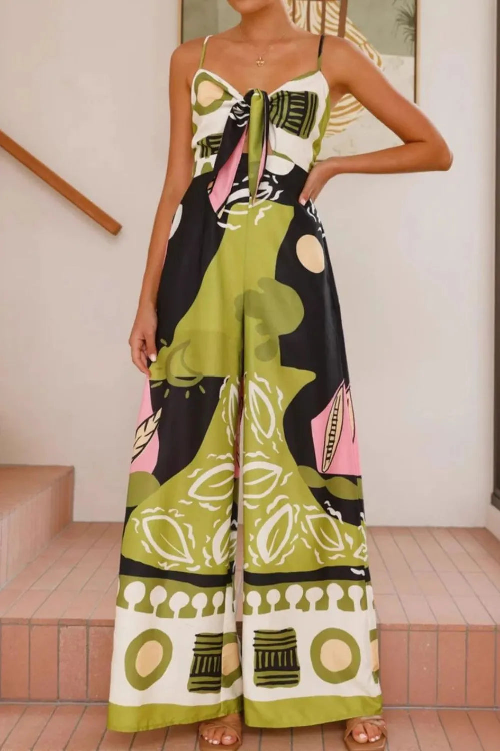 Printed Sweetheart Neck Jumpsuit with Smocked, Tie, and Pockets.