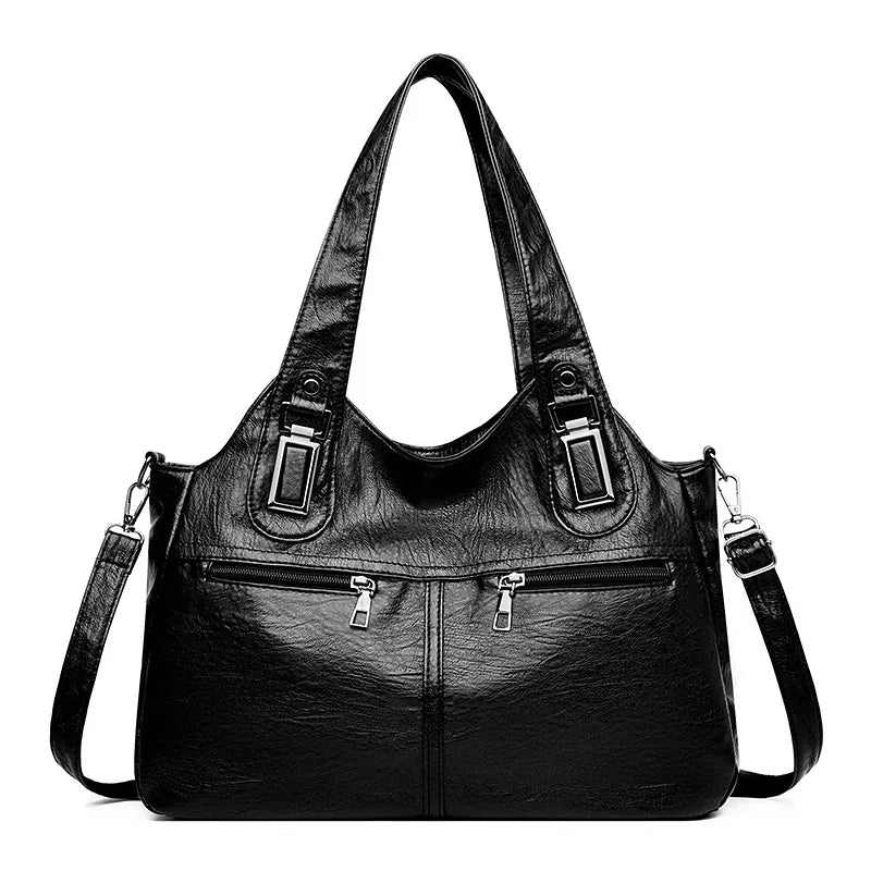 Large vintage-style black PU leather handbag with dual top handles, silver-tone hardware, a front zip pocket, and a detachable adjustable shoulder strap.