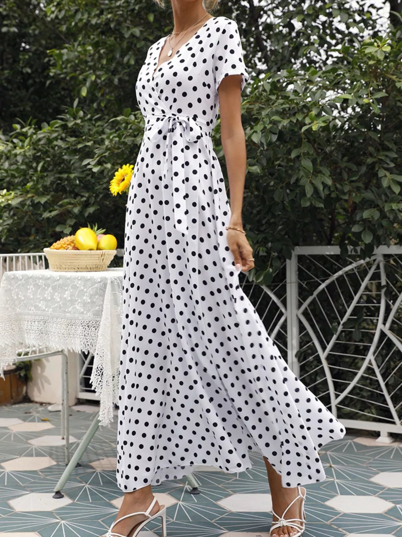 White polka dot wrap maxi dress with short sleeves, V-neck, waist tie and side slit