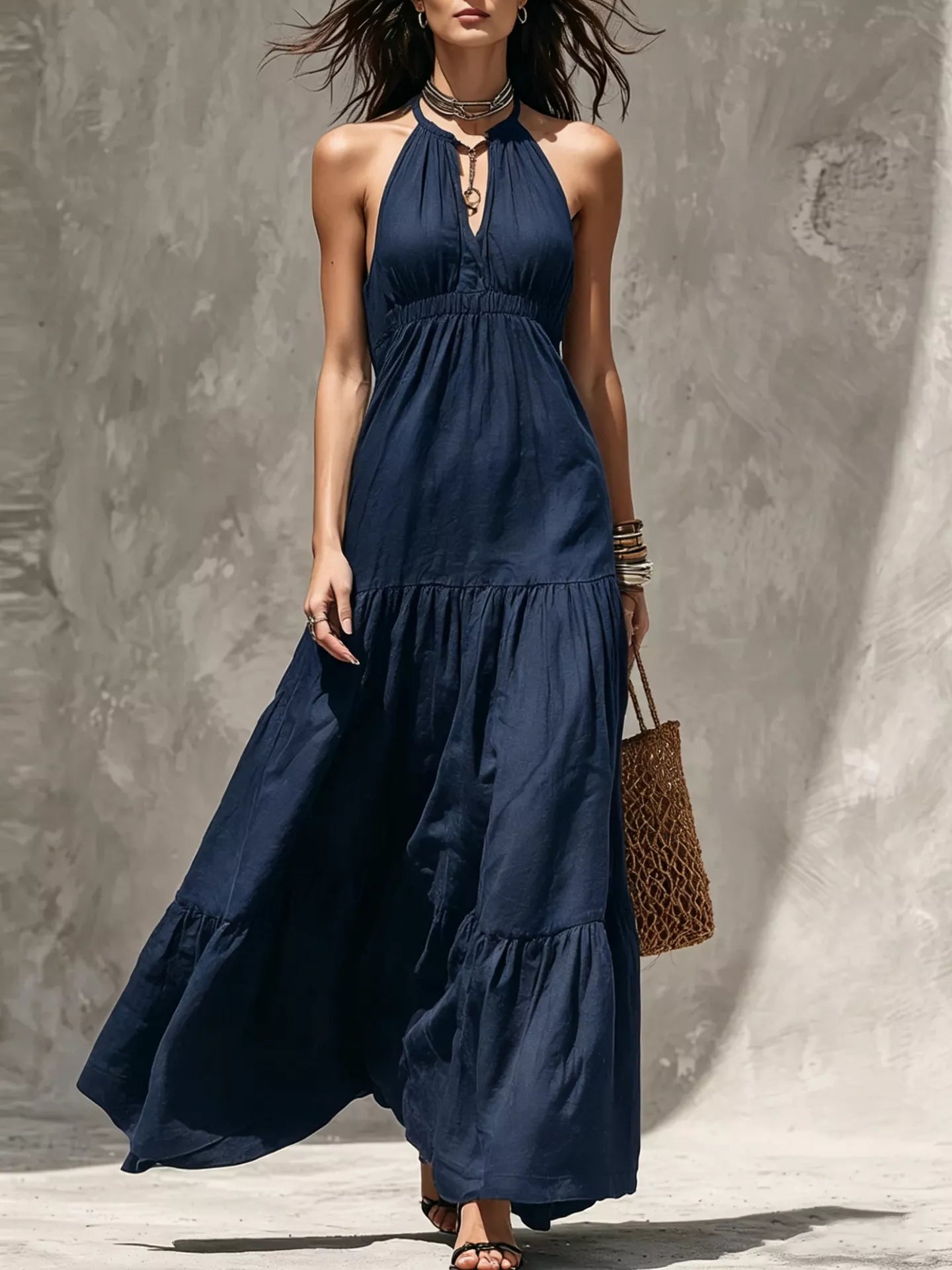 Sleeveless olive green tiered maxi dress with smocked waist and halter neckline