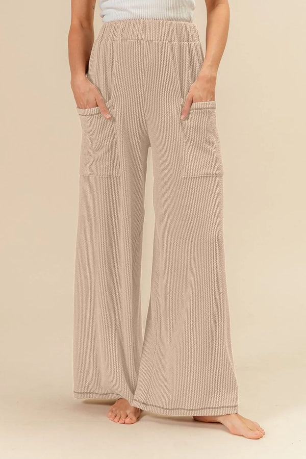 Two-tone cord ribbed waistband side pocket pants.