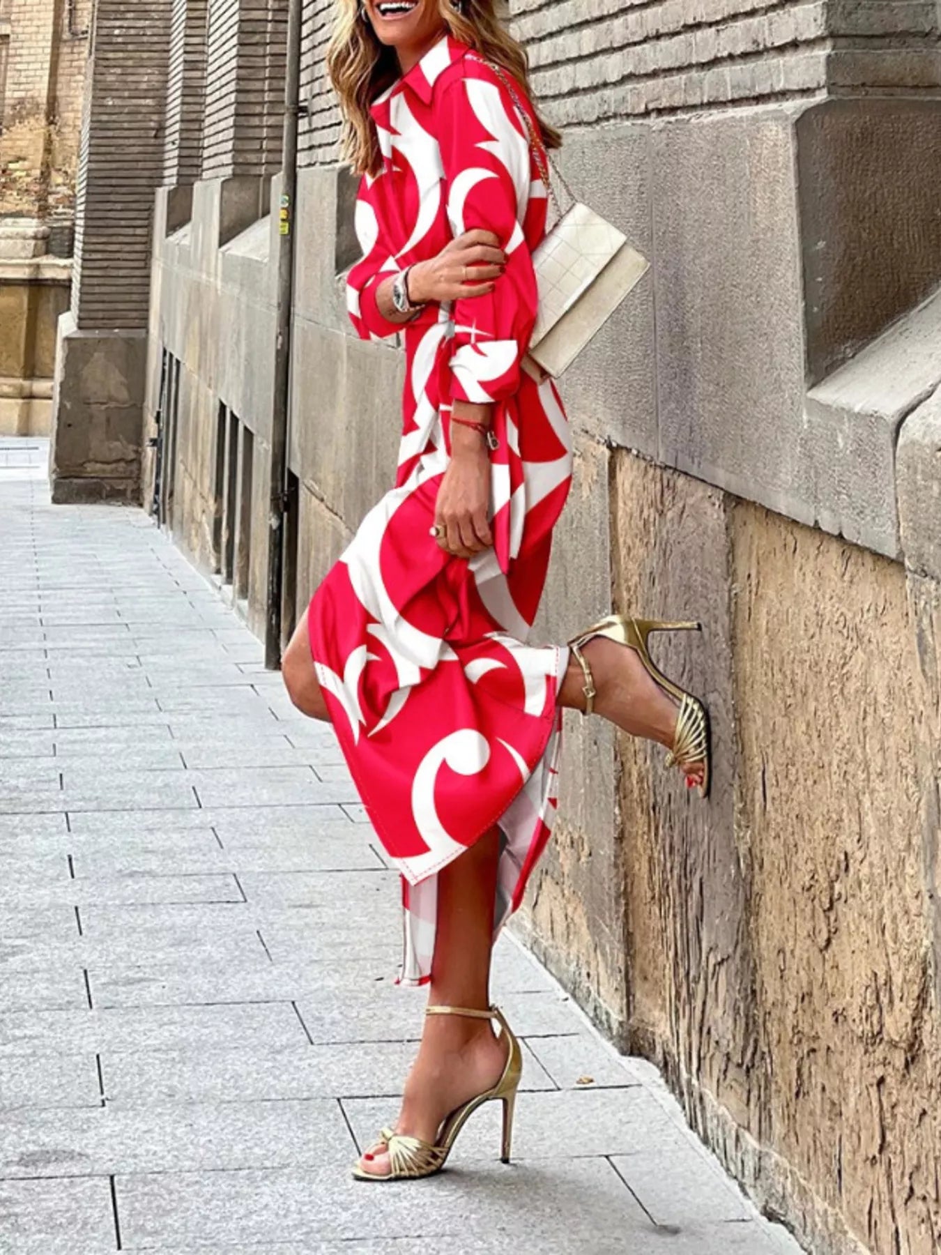 Green and red abstract-print collared midi shirt dress with three-quarter sleeves and a tied waist