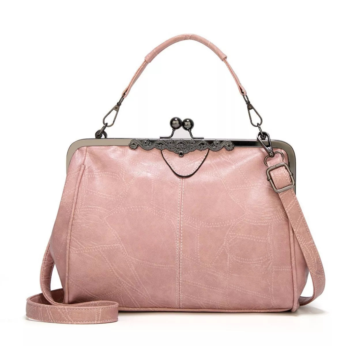 Medium pink PU leather handbag with a structured silhouette, kiss-lock frame, short top handle, detachable shoulder strap, and decorative metal trim.