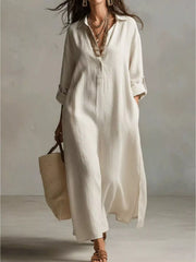 Relaxed plus-size cream midi shirt dress with collar, pockets, button front, and short sleeves