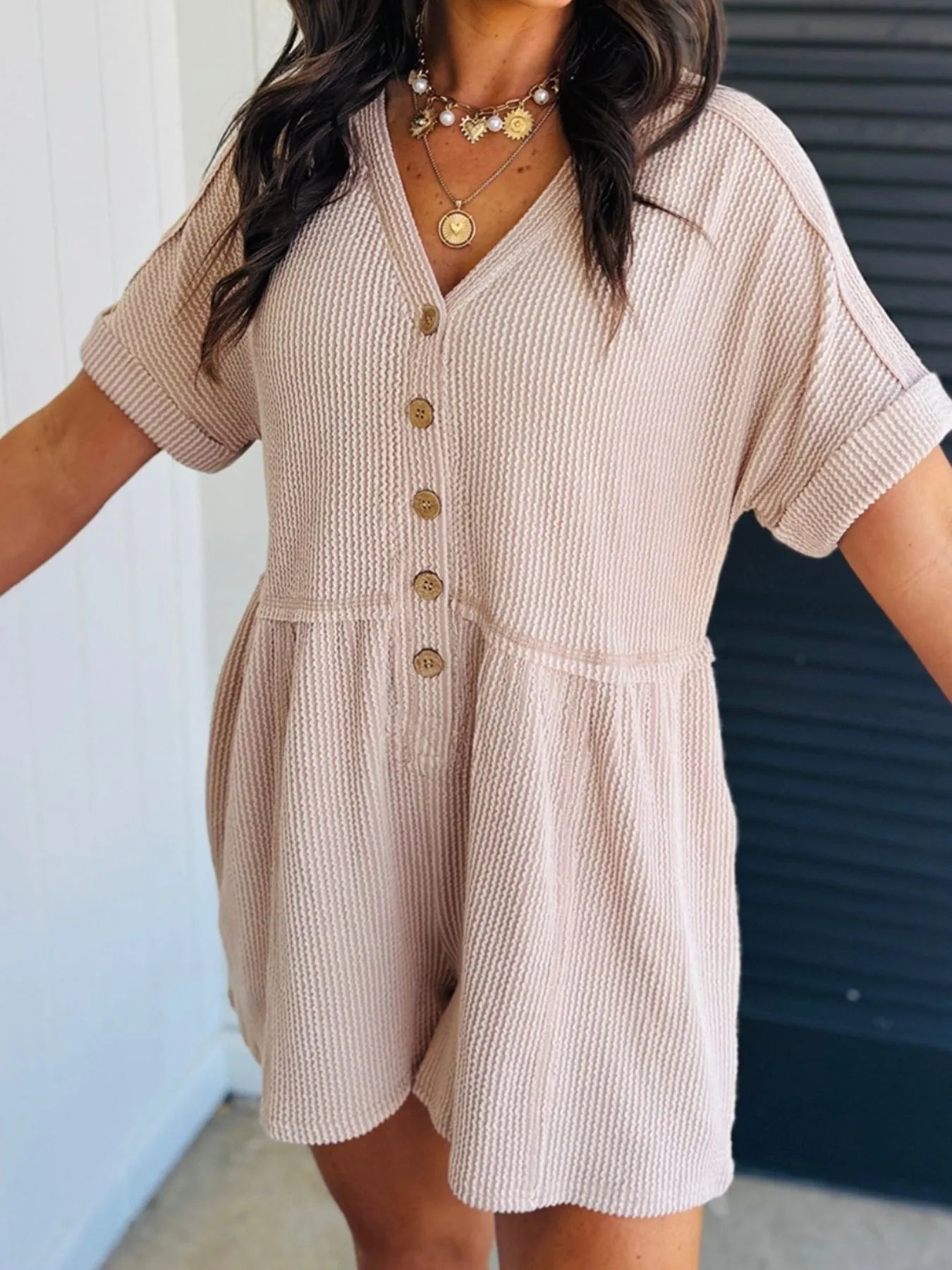 Casual Button-Front Ribbed Romper with Pockets.