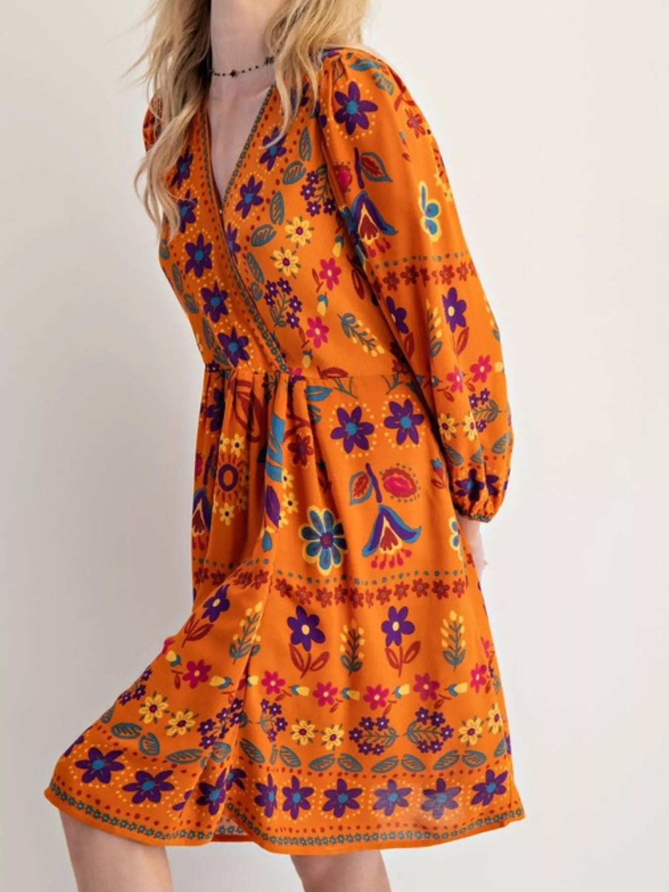 Bohemian Floral Print Long Sleeve Mini Dress with Pockets.