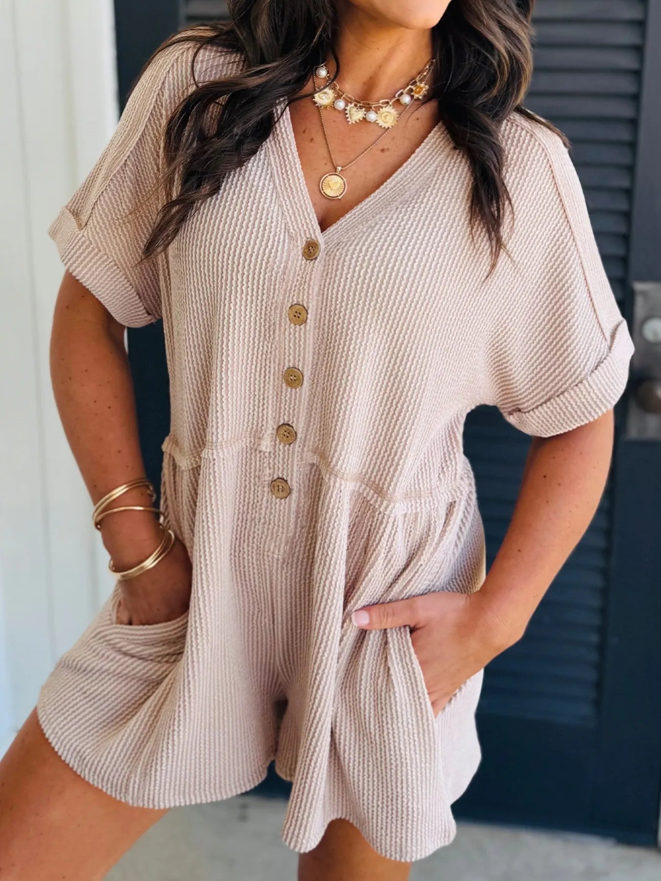 Casual Button-Front Ribbed Romper with Pockets.