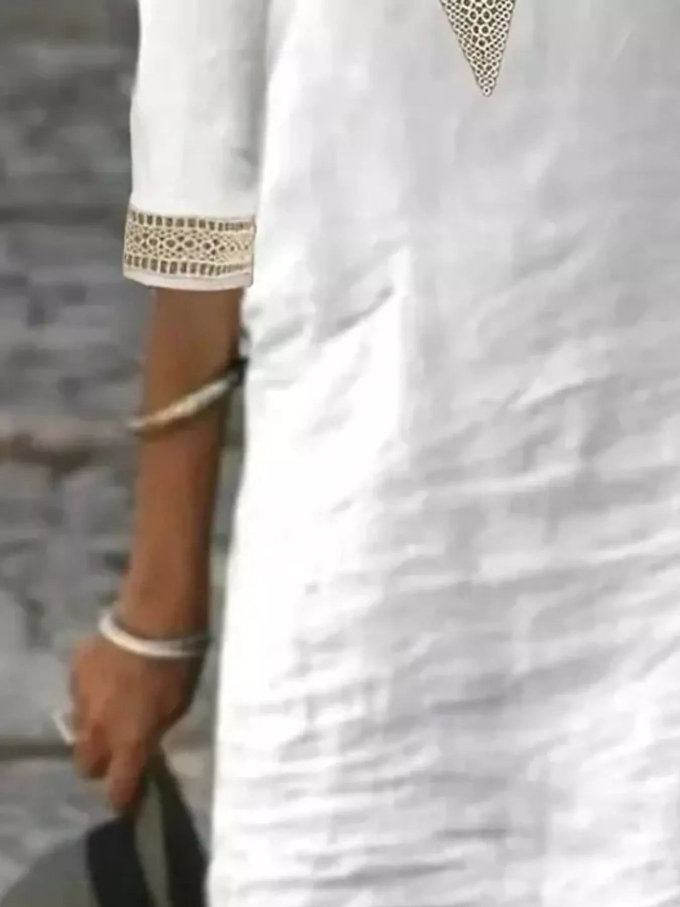 Plus-size white V-neck dress with lace trim and half sleeves