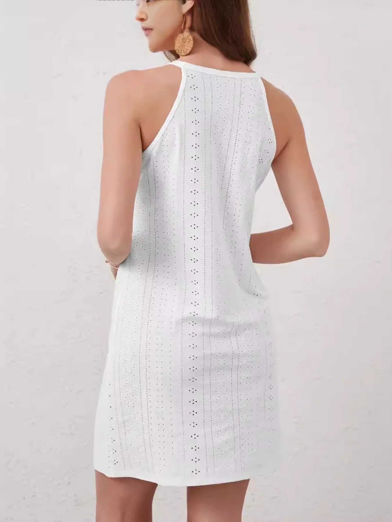 Eyelet Flower Sleeveless Mini Dress.