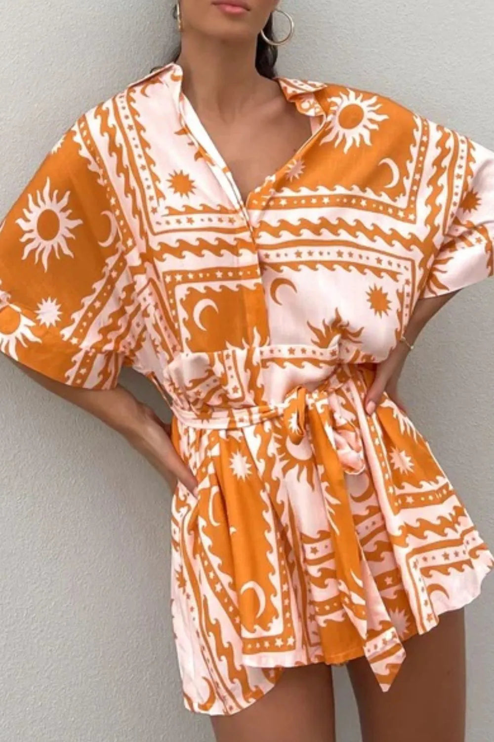 Printed Tie Waist Romper with Buttons.