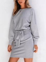 Gray ribbed mini dress with long sleeves, round neckline, and tie waist