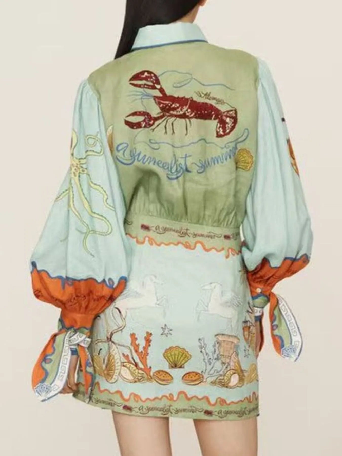 Printed Notched Neck Flutter Sleeve Mini Dress with Ruffles.