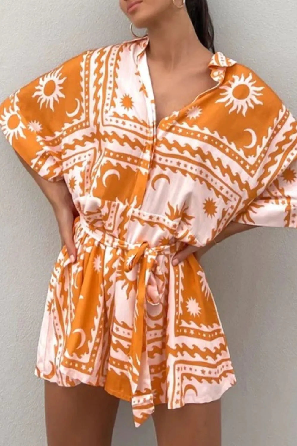 Printed Tie Waist Romper with Buttons.