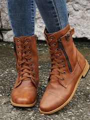A model wears brown PU leather lace-up boots with side zippers, rounded toes, stitched panels, and low block heels.