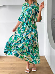 Green tropical leaf print tiered midi dress with V-neck and half sleeves