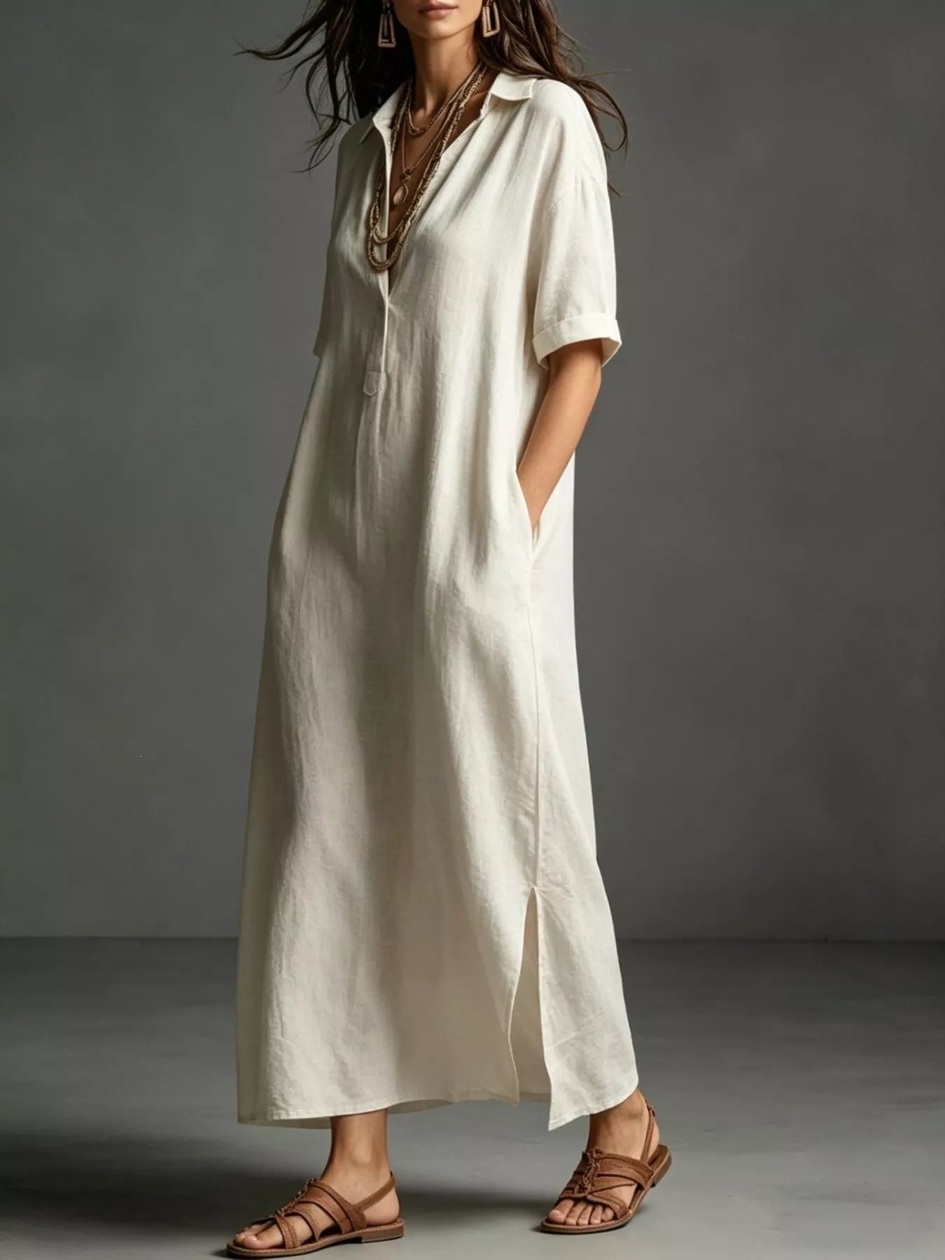 Relaxed plus-size cream midi shirt dress with collar, pockets, button front, and short sleeves