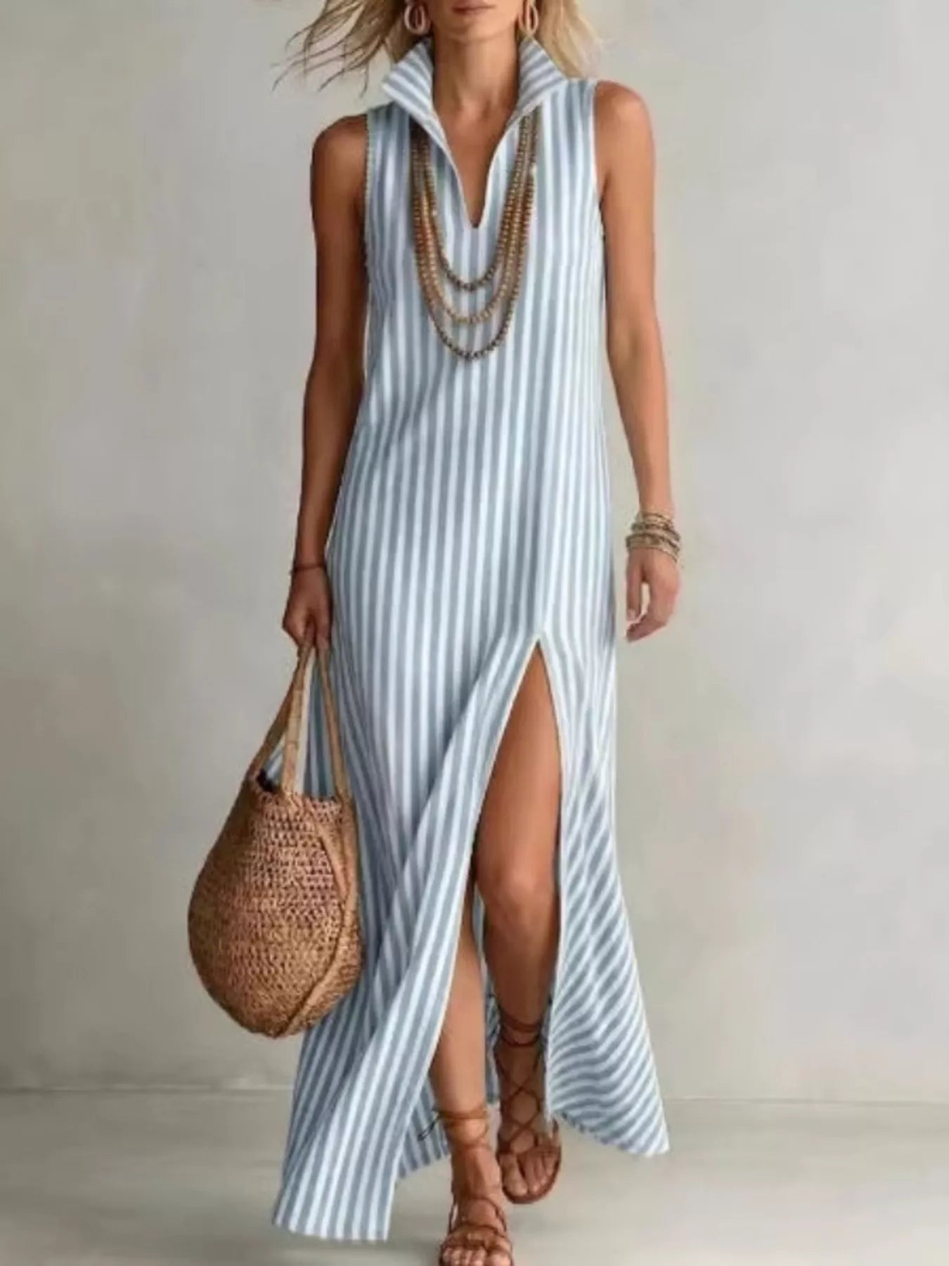 Plus-size striped polyester maxi dress with sleeveless collared design and high front slit