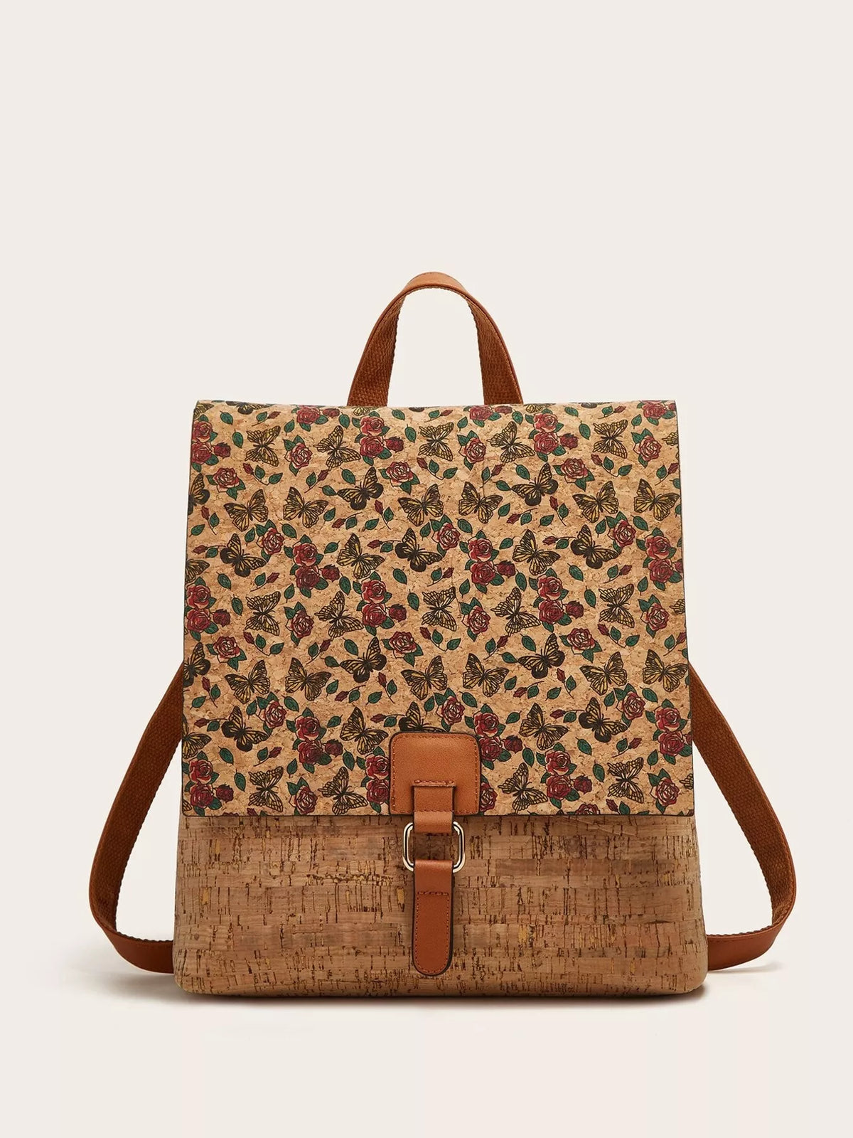 Vintage-inspired medium PU leather backpack with a tan bark-textured body, floral and butterfly print flap, brown shoulder straps, and buckle closure.