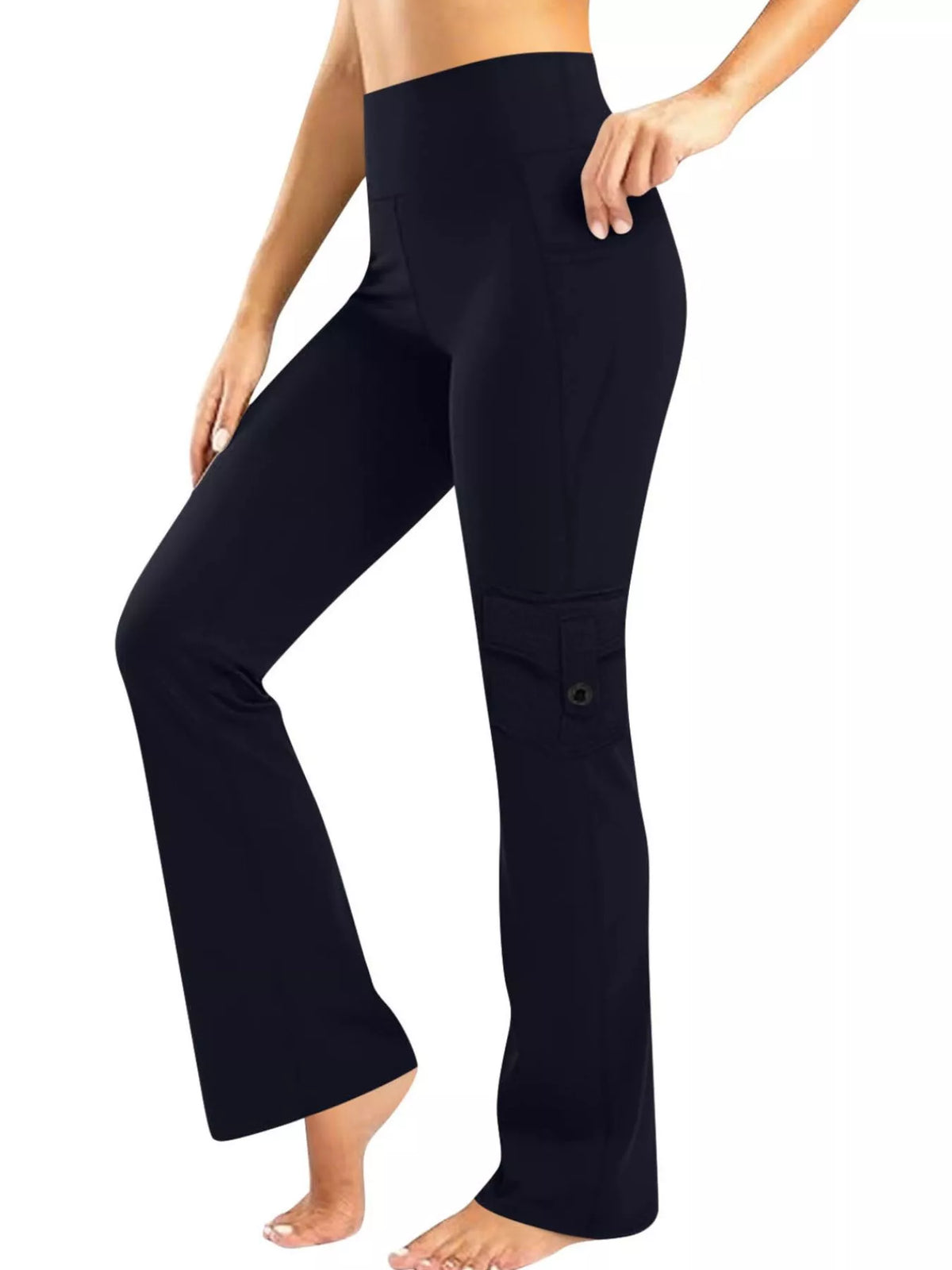 A model poses in high-waisted black yoga pants with a relaxed wide-leg silhouette, side pockets, and a buttoned cargo-style pocket on the lower leg.