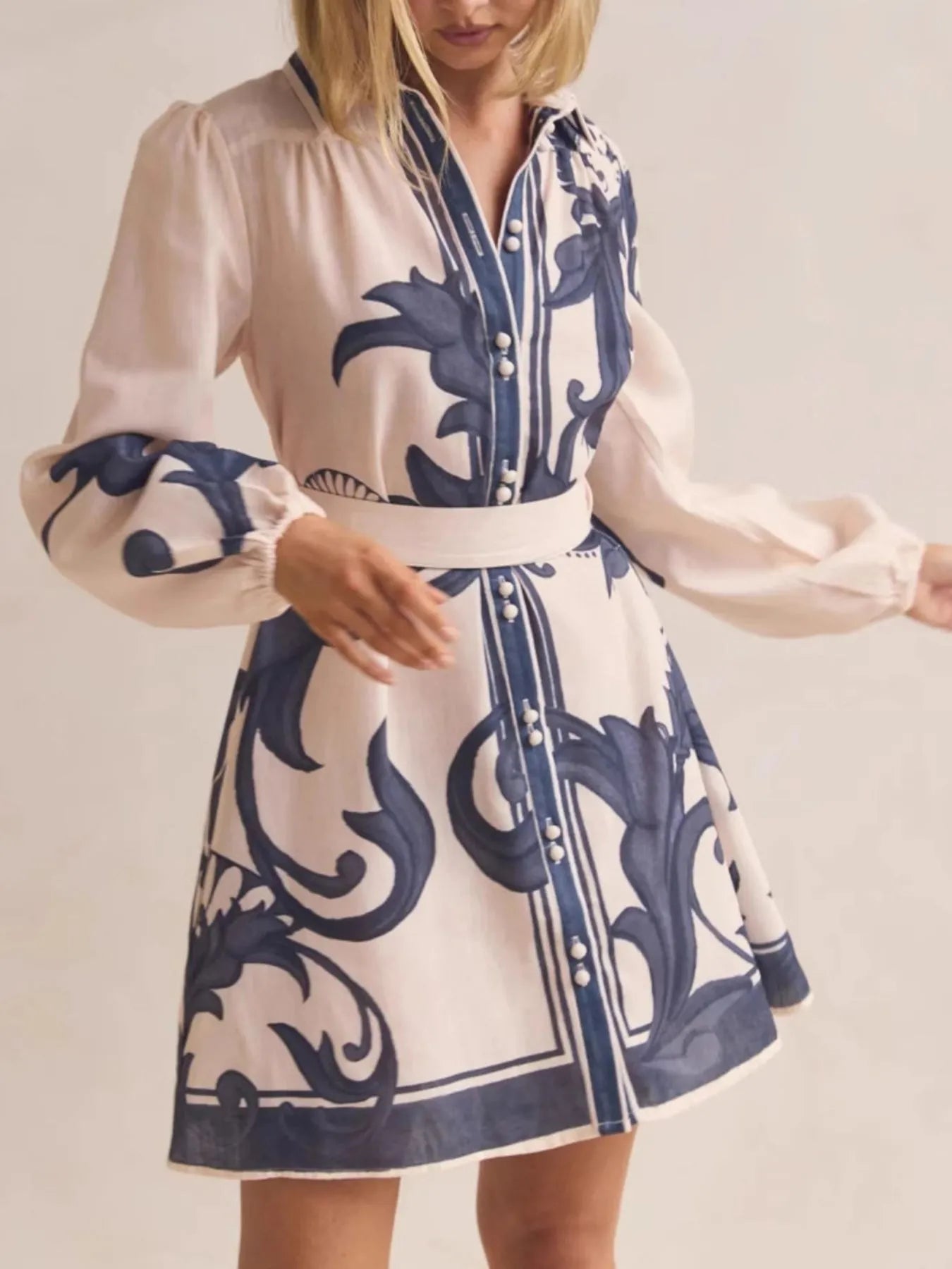 Printed Long Sleeve Shirt Dress with Tied Detail.