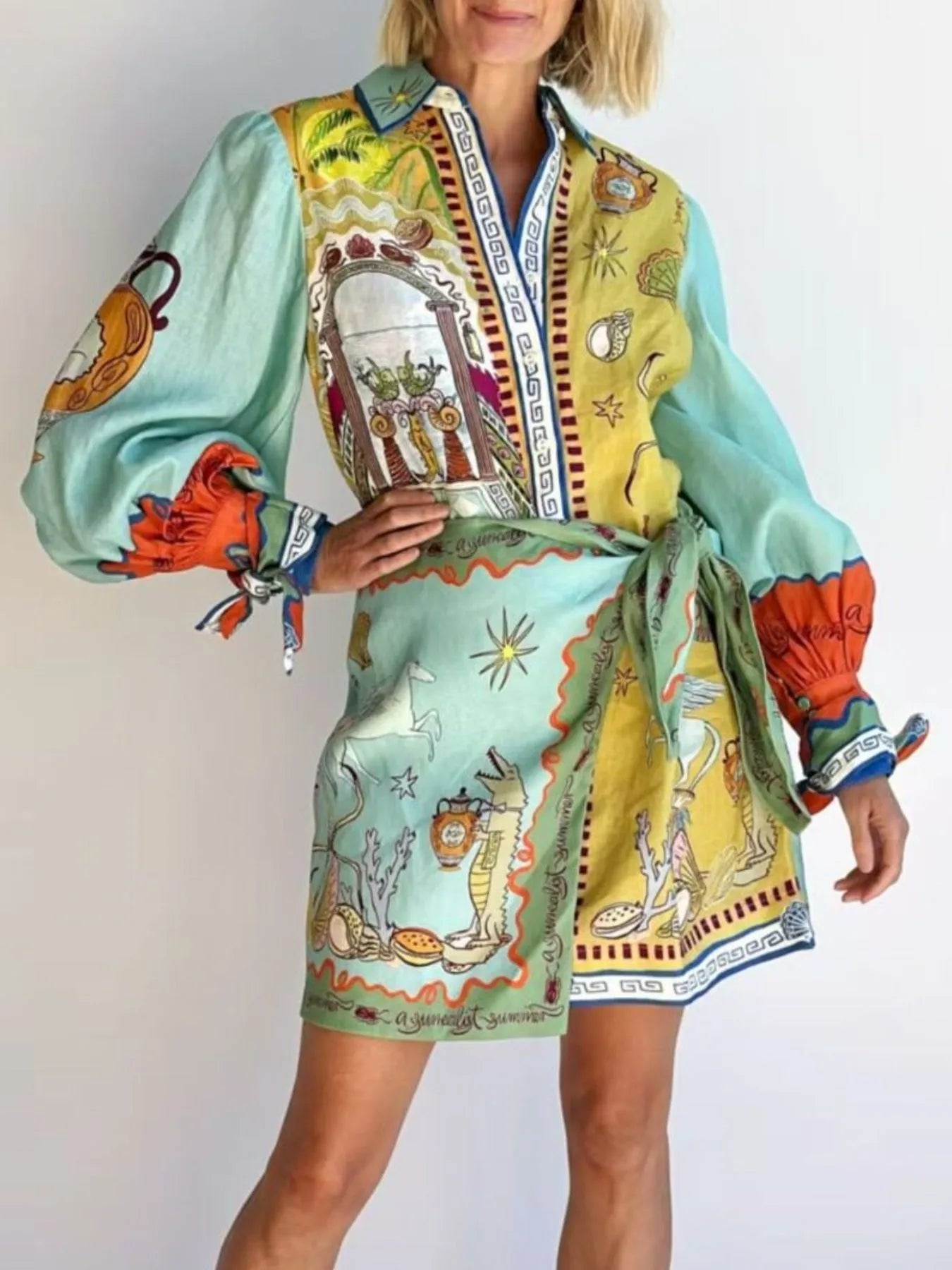 Printed Notched Neck Flutter Sleeve Mini Dress with Ruffles.