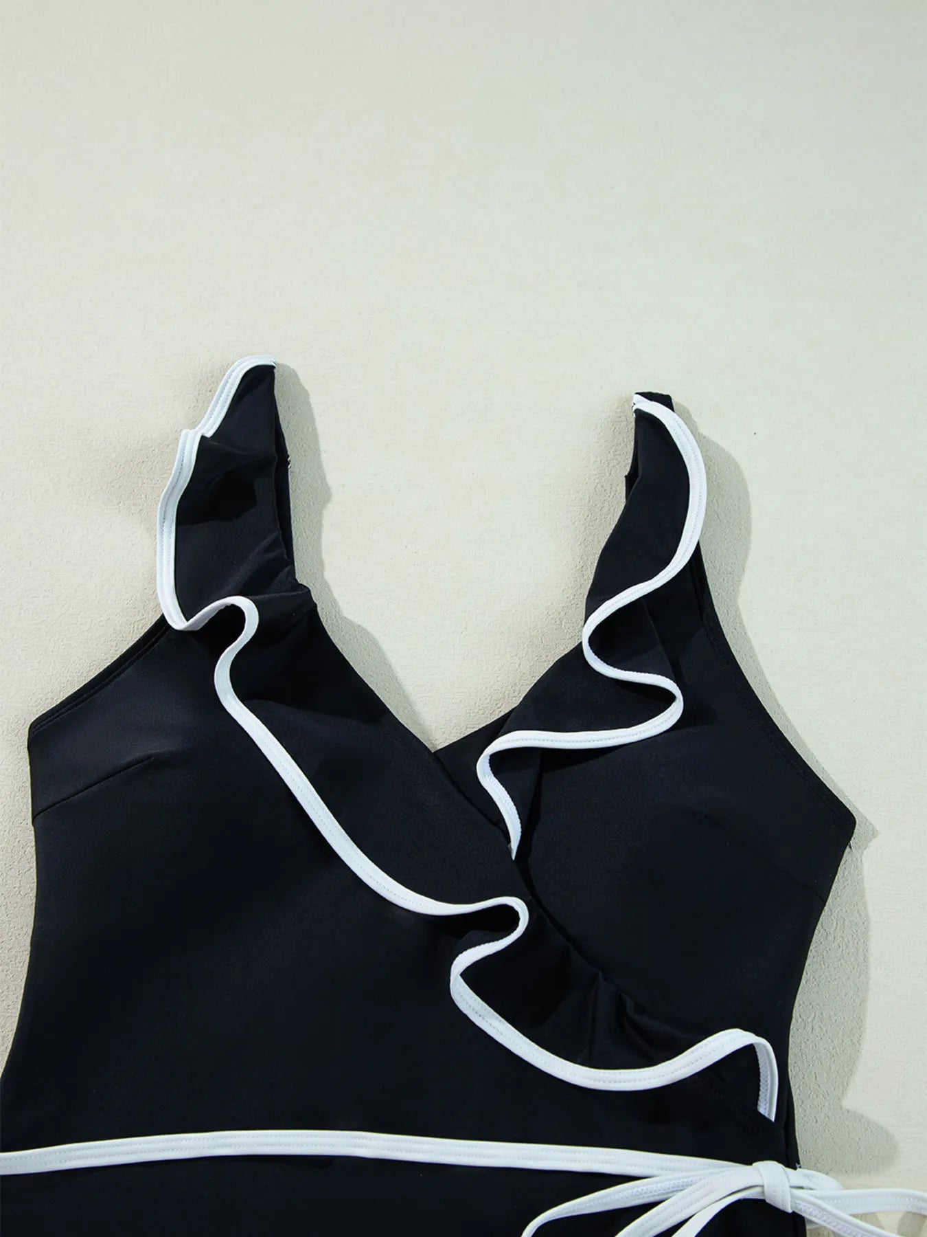 Ruffle Trim V-Neck One-Piece Swimsuit with Removable Padding.