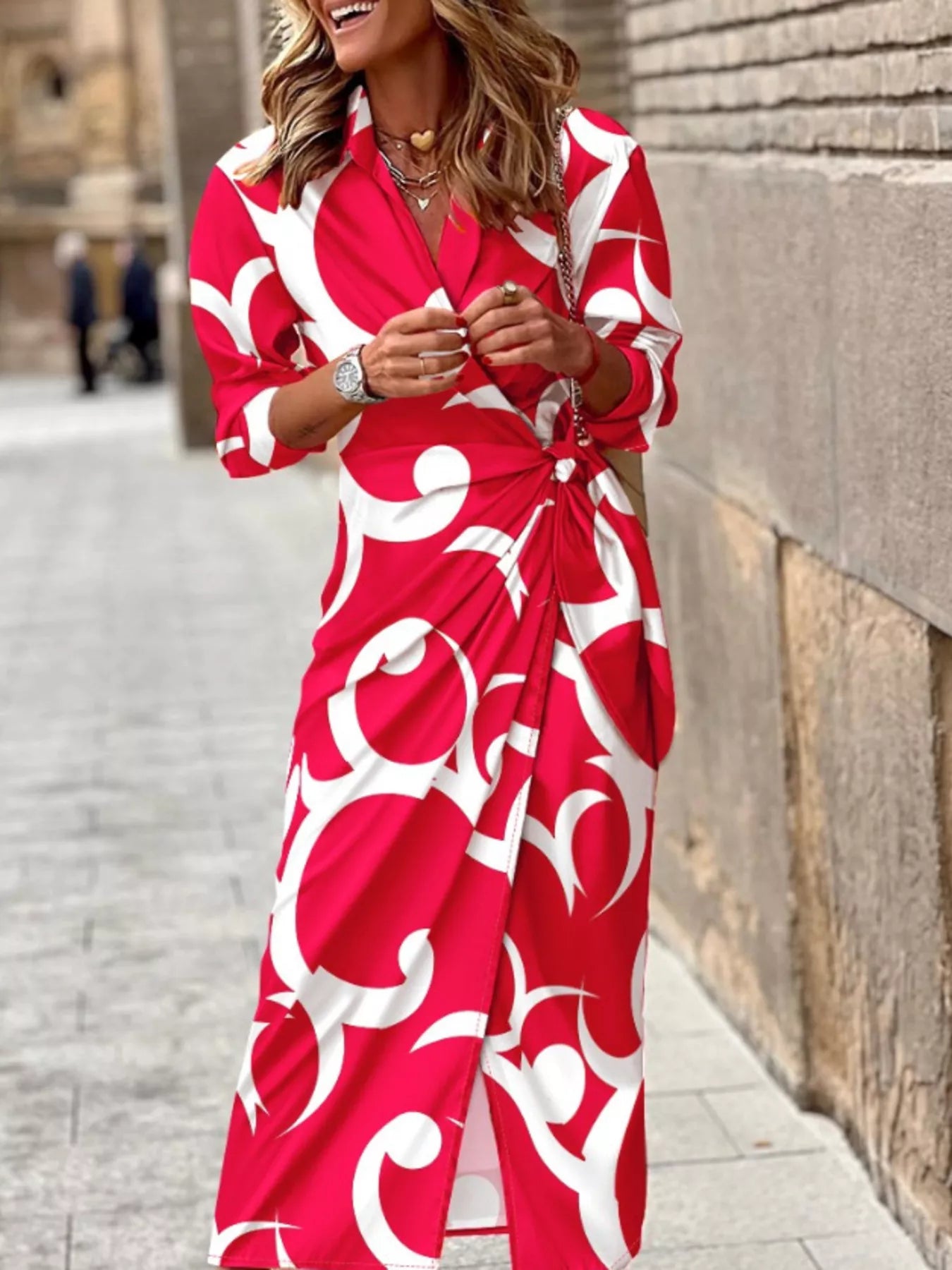 Green and red abstract-print collared midi shirt dress with three-quarter sleeves and a tied waist