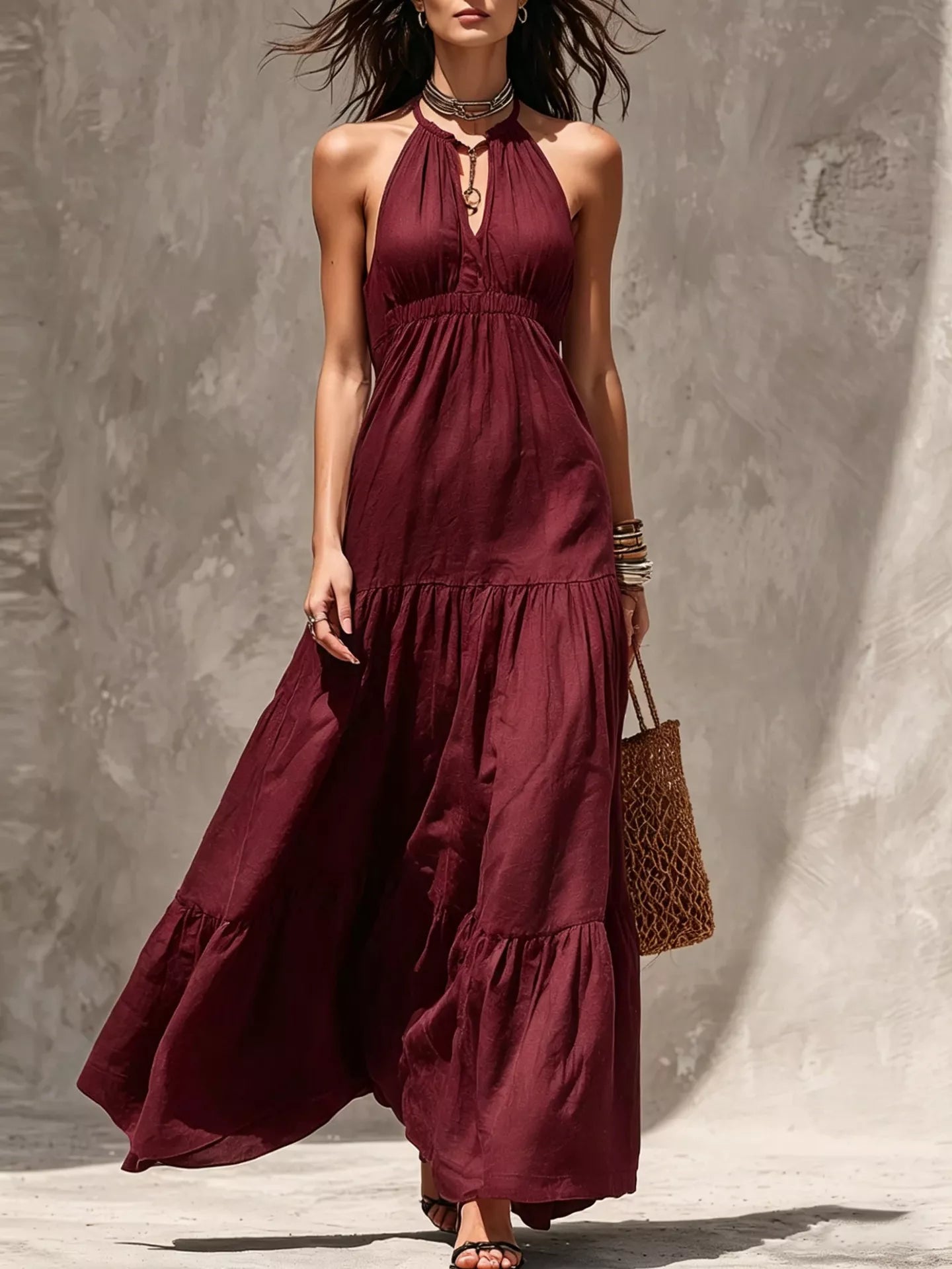 Sleeveless olive green tiered maxi dress with smocked waist and halter neckline