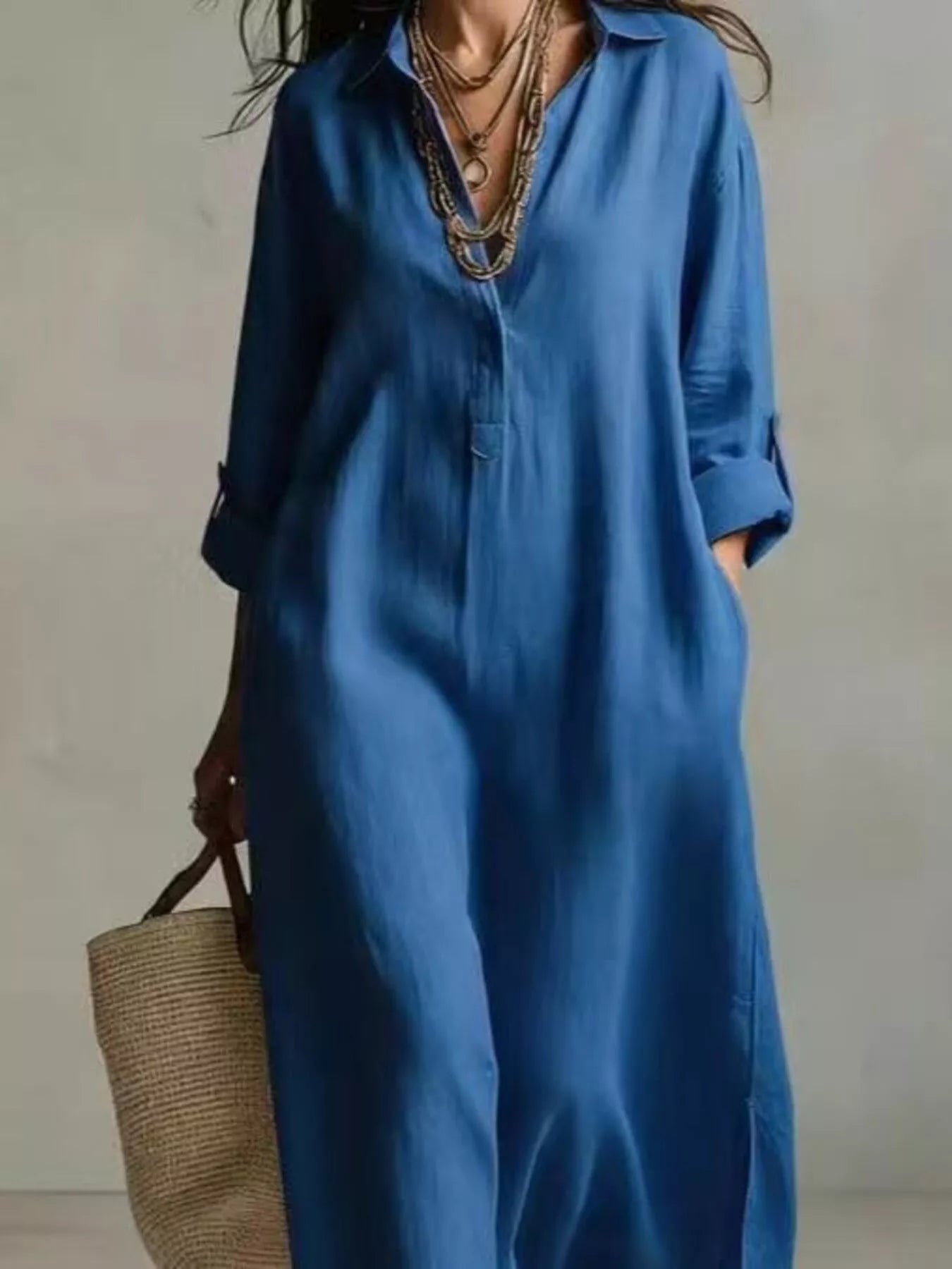 Relaxed plus-size cream midi shirt dress with collar, pockets, button front, and short sleeves