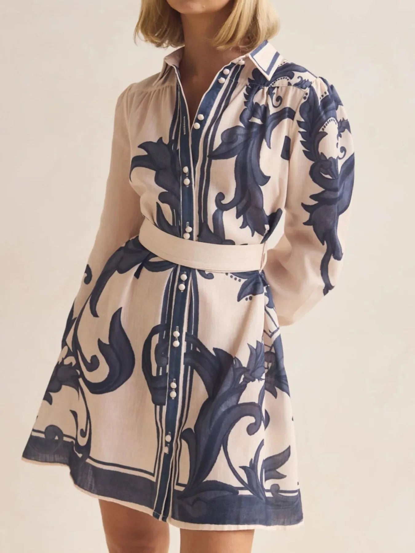 Printed Long Sleeve Shirt Dress with Tied Detail.