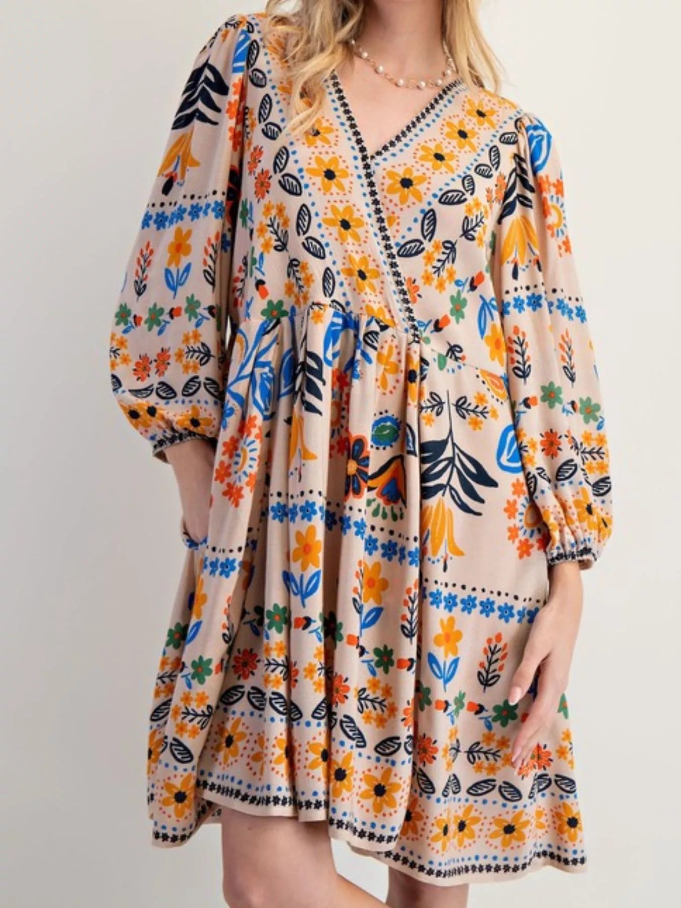 Bohemian Floral Print Long Sleeve Mini Dress with Pockets.