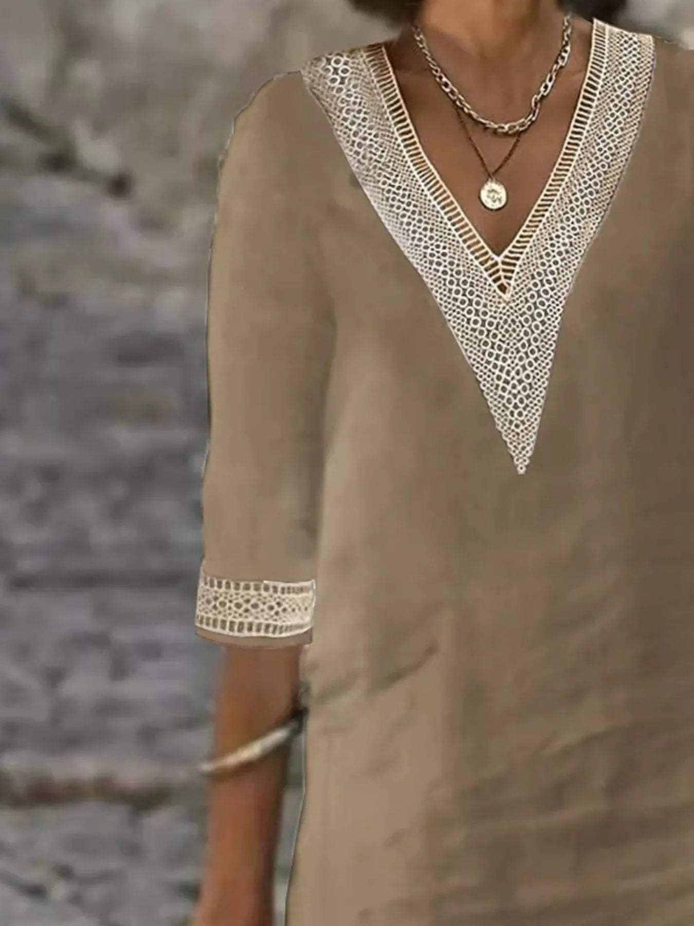 Plus-size white V-neck dress with lace trim and half sleeves