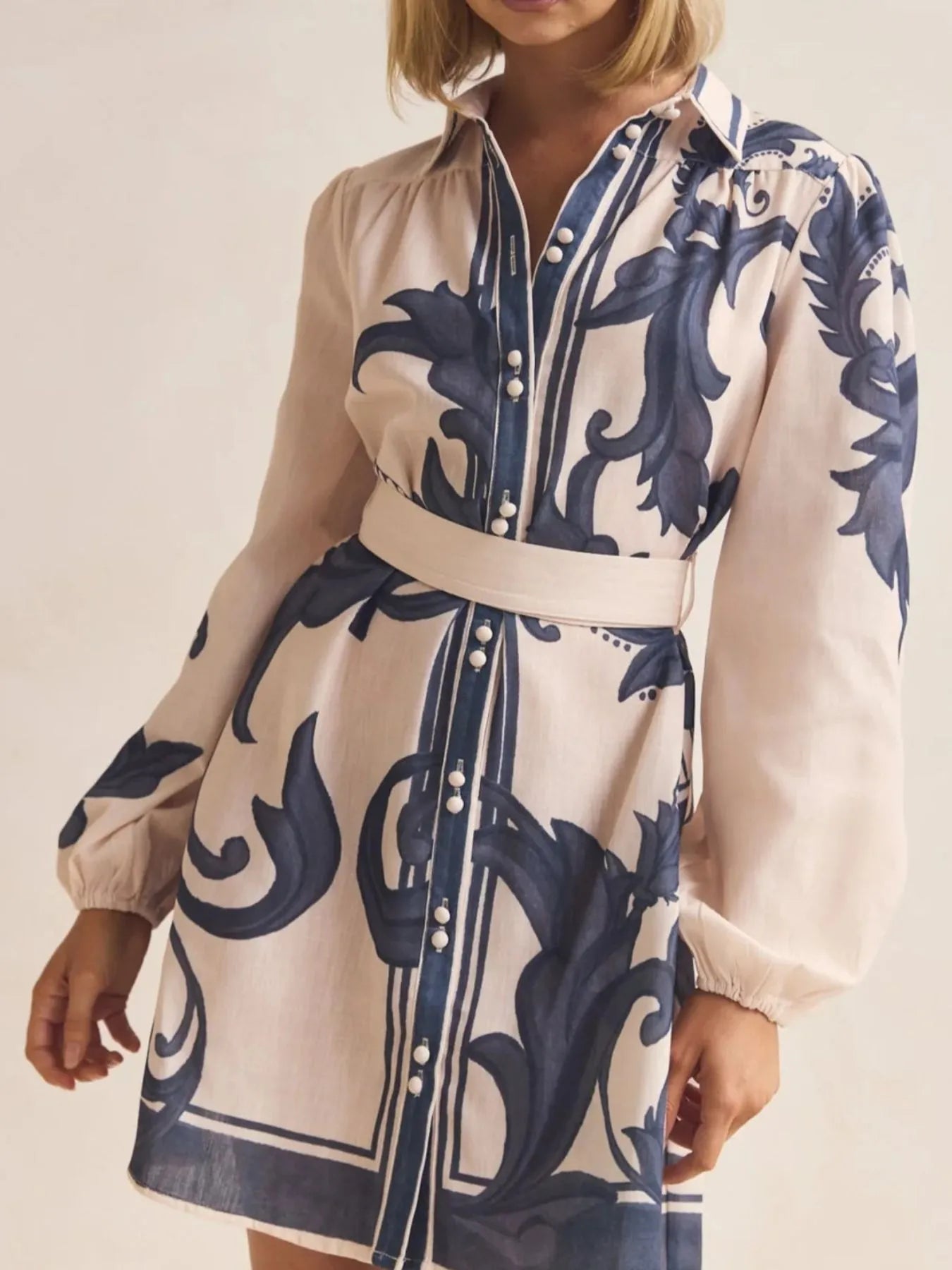 Printed Long Sleeve Shirt Dress with Tied Detail.