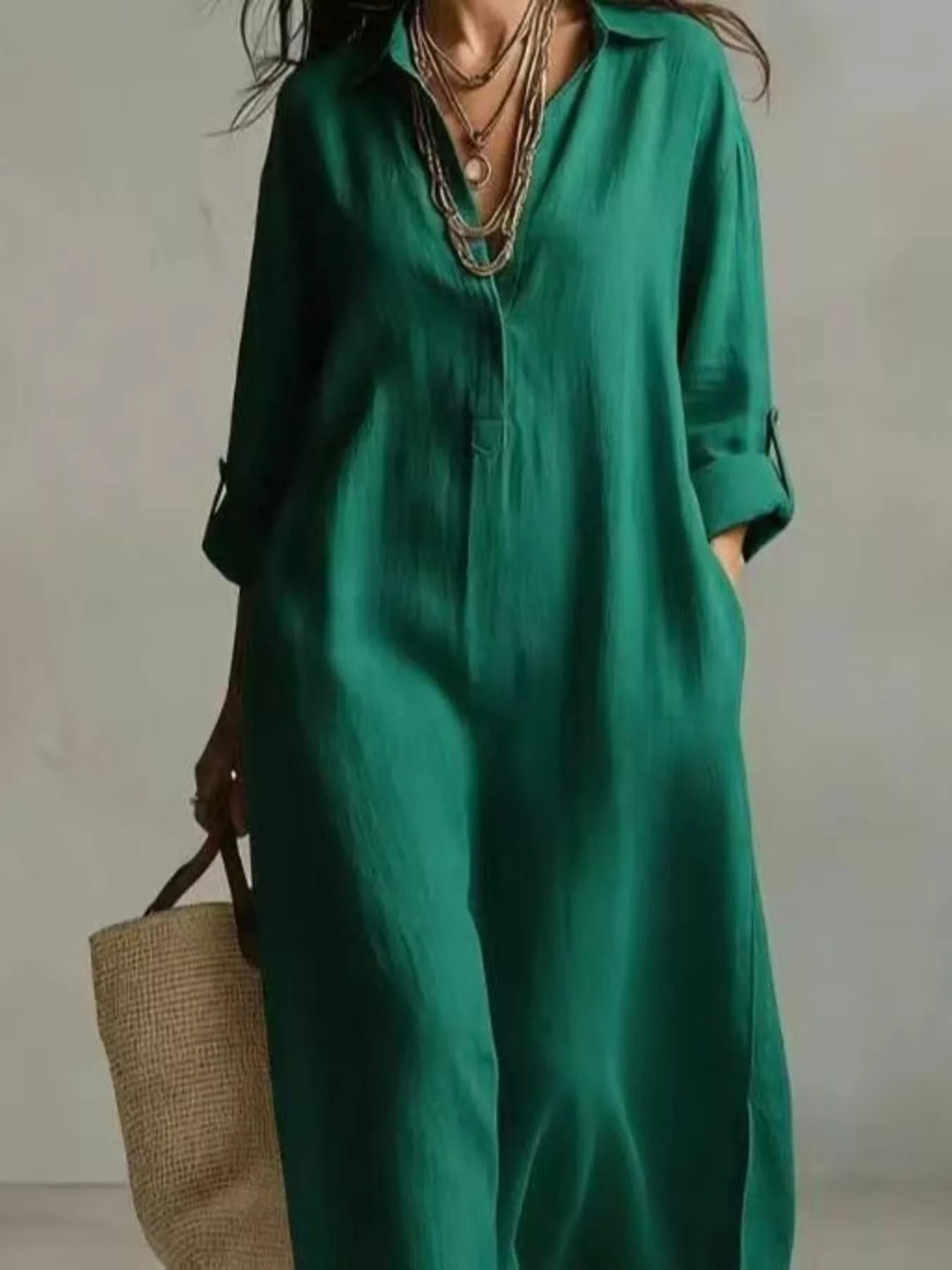 Relaxed plus-size cream midi shirt dress with collar, pockets, button front, and short sleeves