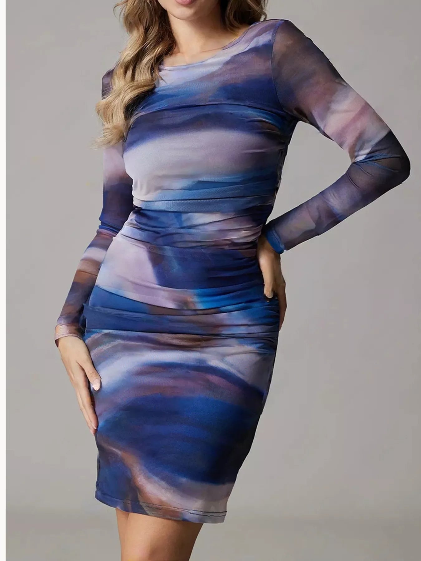 Wrap Cami Mini Dress with Tie Detail and Ruffles.