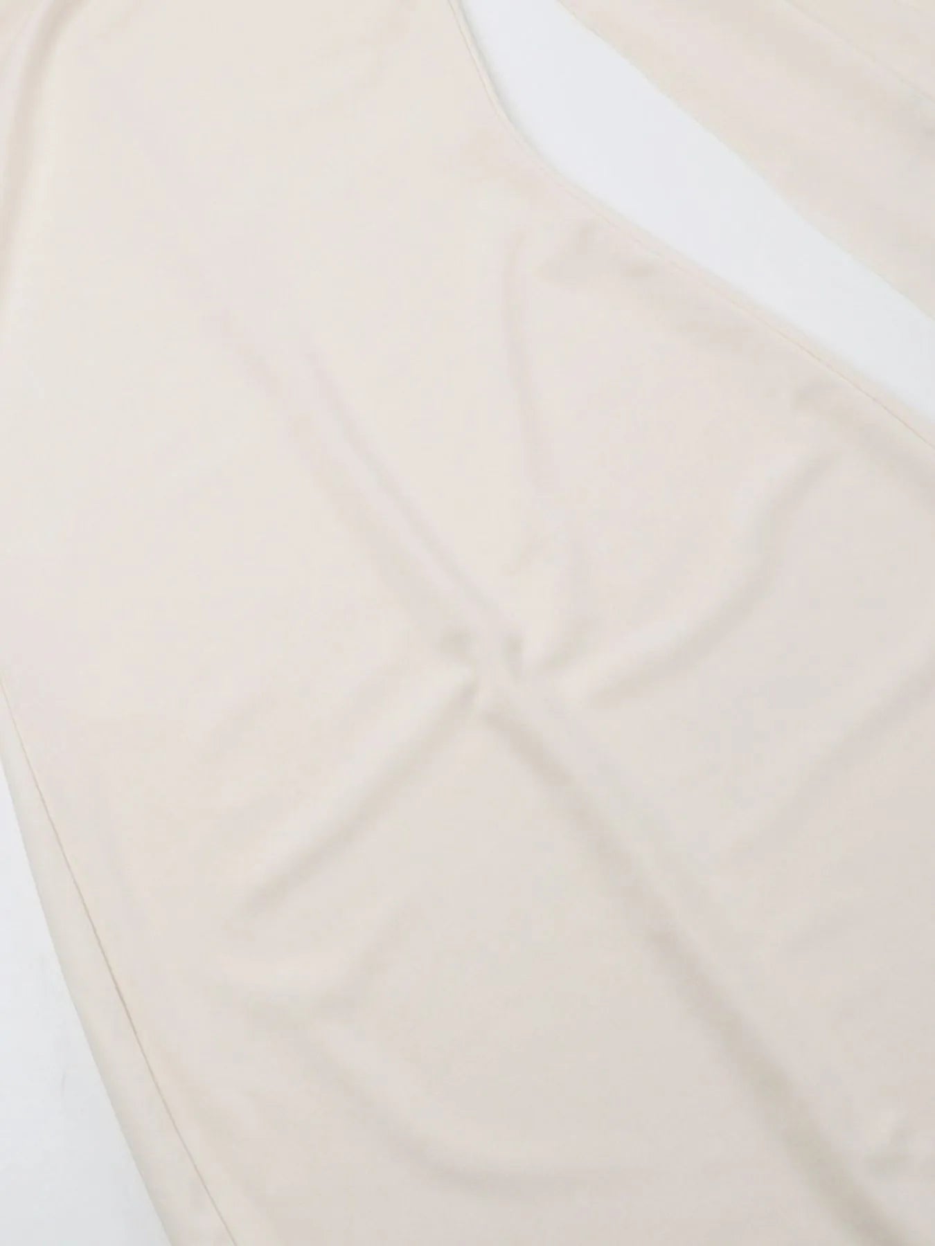 Asymmetrical Tied Sleeveless Maxi Dress.