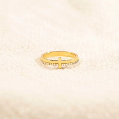 A gold-plated 925 sterling silver cross ring features a slim band, polished finish, and delicate zircon detailing for a refined everyday silhouette.